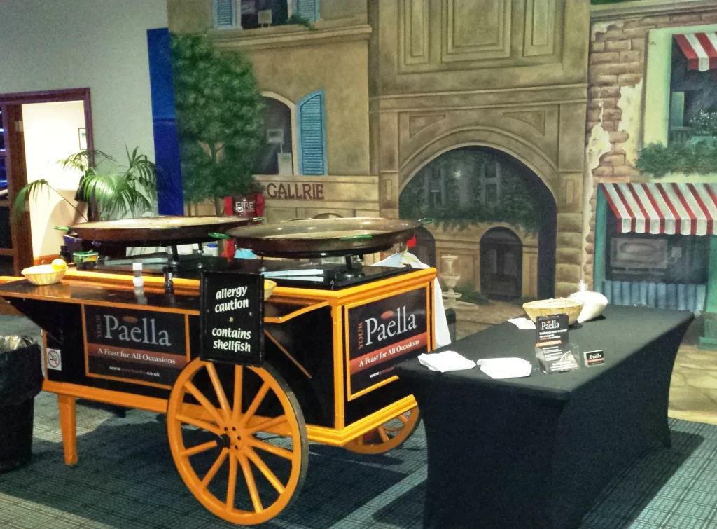 Your Paella cart set up for a corporate Paella catering event indoors